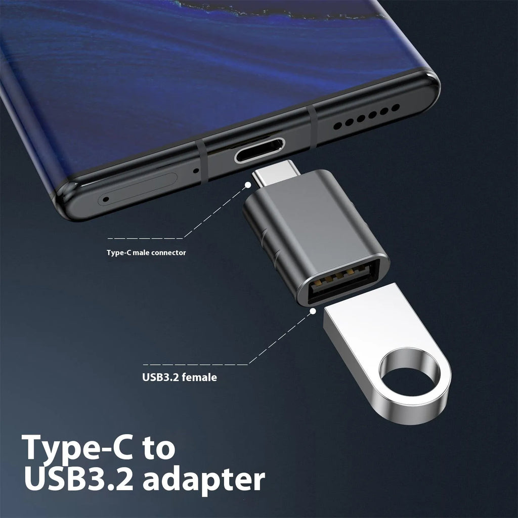 USB-C to USB-A converter with metallic zinc alloy shell in Space Grey finish.