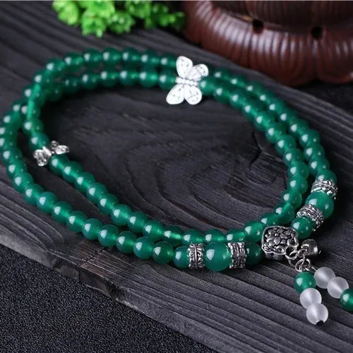 Green multi-layer agate bracelet with three strands of hand-made 6mm beads.