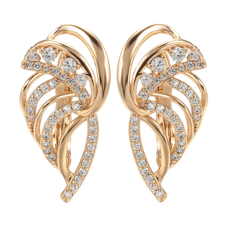 Gold geometric wing-shaped ear clips with micro inlaid stones on U-shaped copper clips
