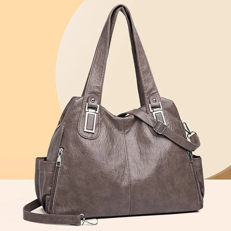 Soft PU square vertical tote bag for women in multiple colours with a single shoulder strap.
