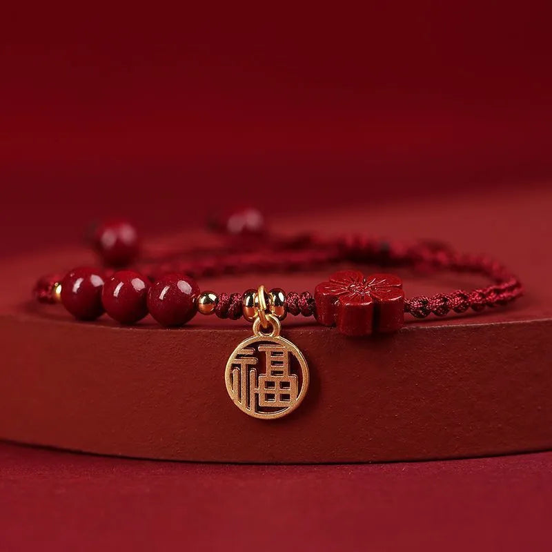 Cinnabar bracelet with braided rope and peach blossom charm for exam luck