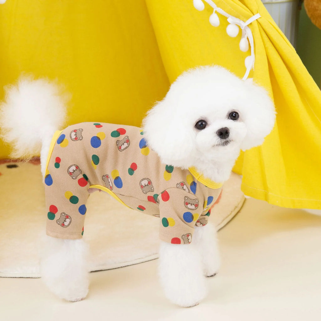 Beige dog jumper with colourful ball bear print, shown on a dog, made from cotton and spandex blend.