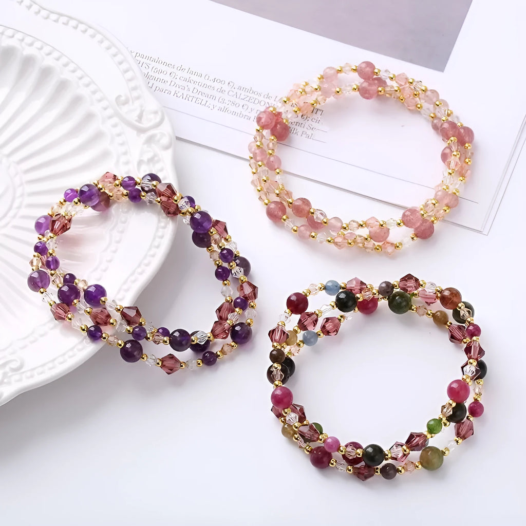 Women's adjustable three-ring bracelet with tourmaline, strawberry quartz and amethyst crystals on cord