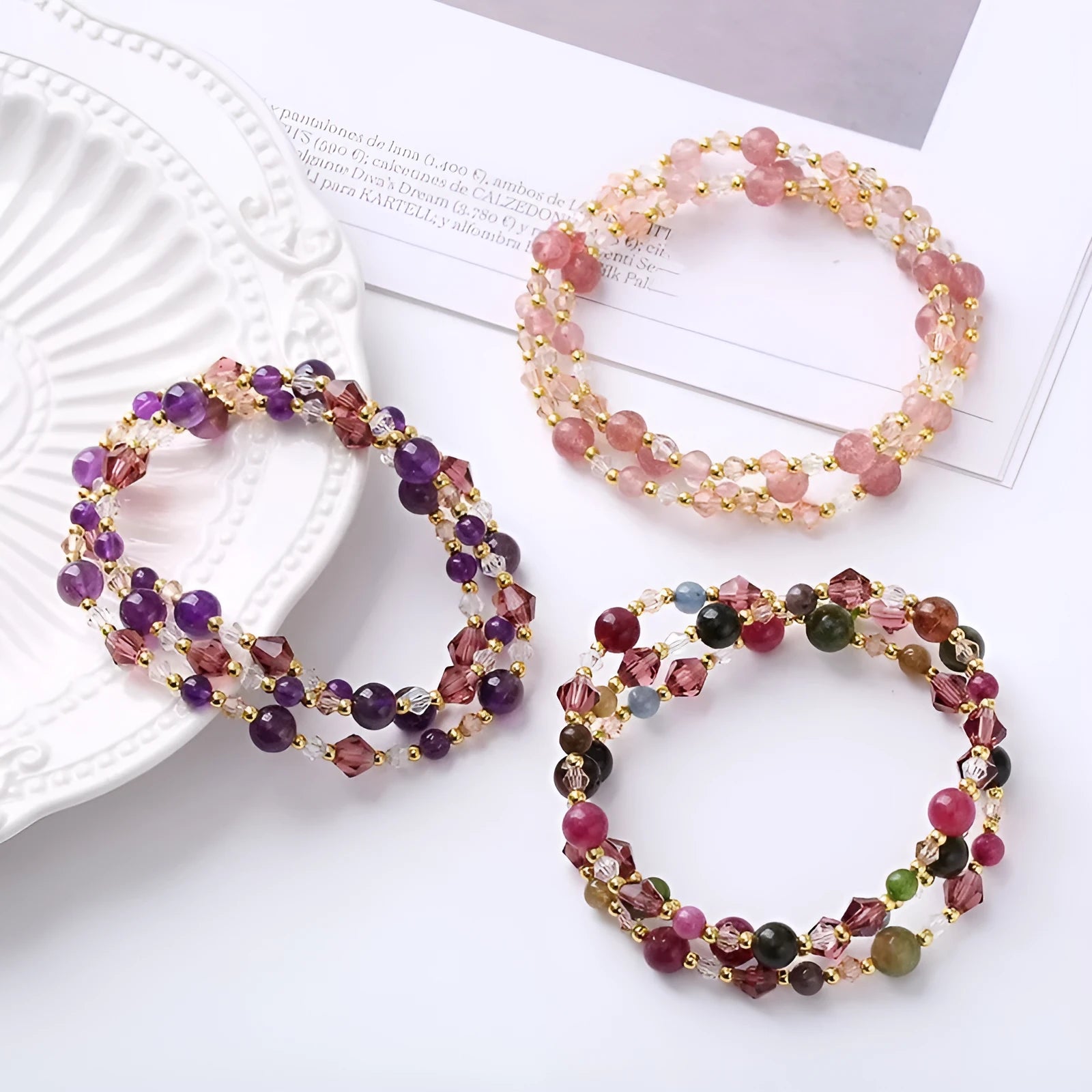 Women's adjustable three-ring bracelet with tourmaline, strawberry quartz and amethyst crystals on cord
