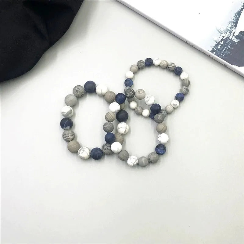 Handmade planet stone men's bracelet with U-shaped adjustable design showing natural stone beads