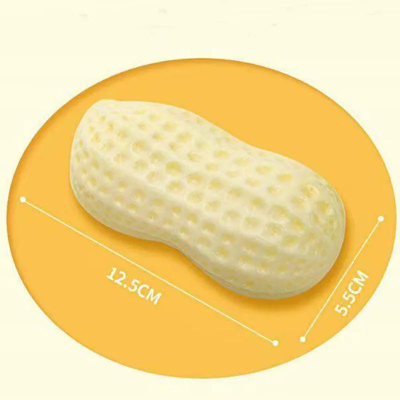 Yellow TPR peanut-shaped dog chew toy with textured surface for dental cleaning