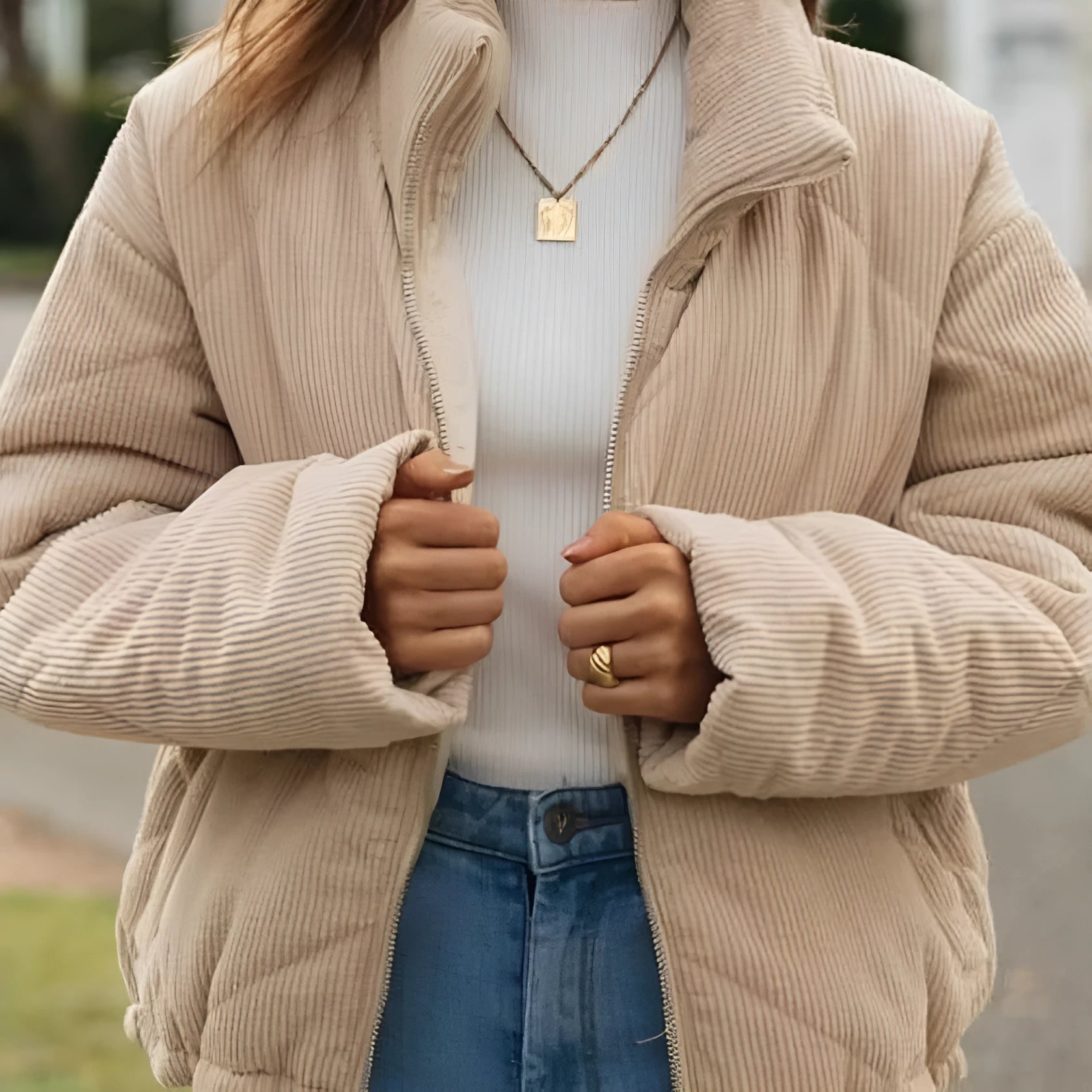 Apricot women's corduroy wadded jacket with a stand collar and front zip.