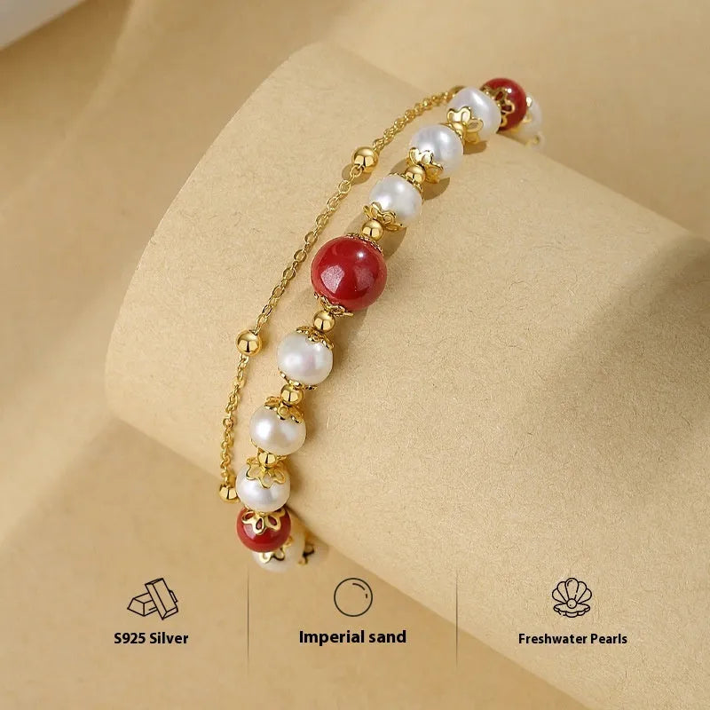 Sterling silver double-layer bracelet with red bean freshwater pearls and geometric bean charms in new Chinese style