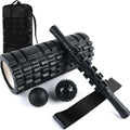 Black six-piece segmented foam massage roller measuring 33cm in length