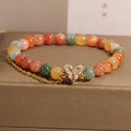 Women's Fu Lu Shou crystal bracelet with a central V-shaped zircon detail on a clear band