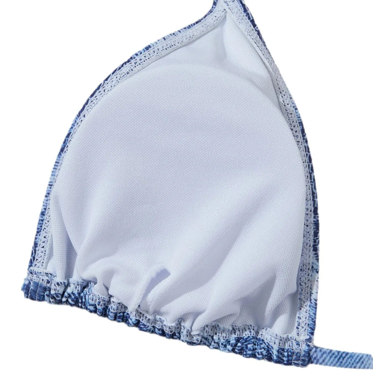 Denim blue printed women's bikini set with strap design on a white background.