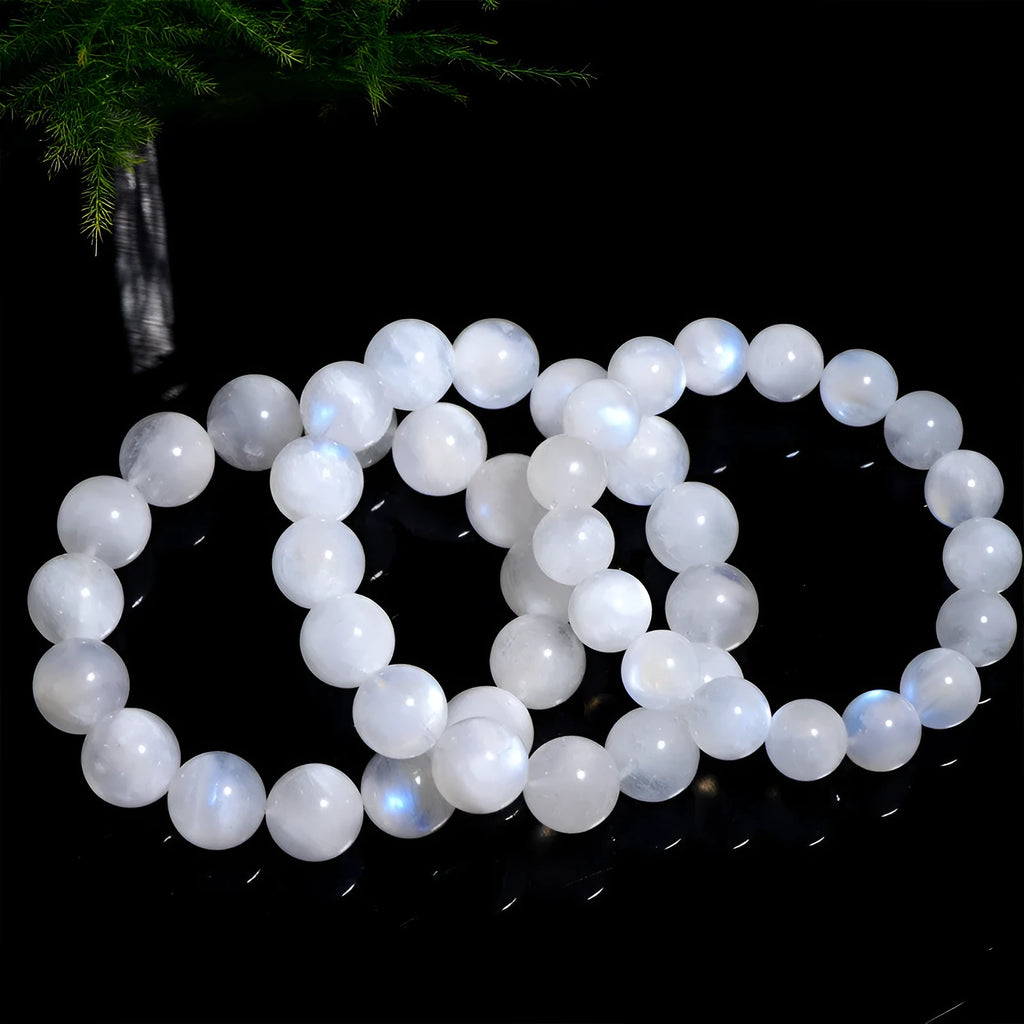 Natural blue moonstone bead bracelet with round geometry-shaped beads on wrist