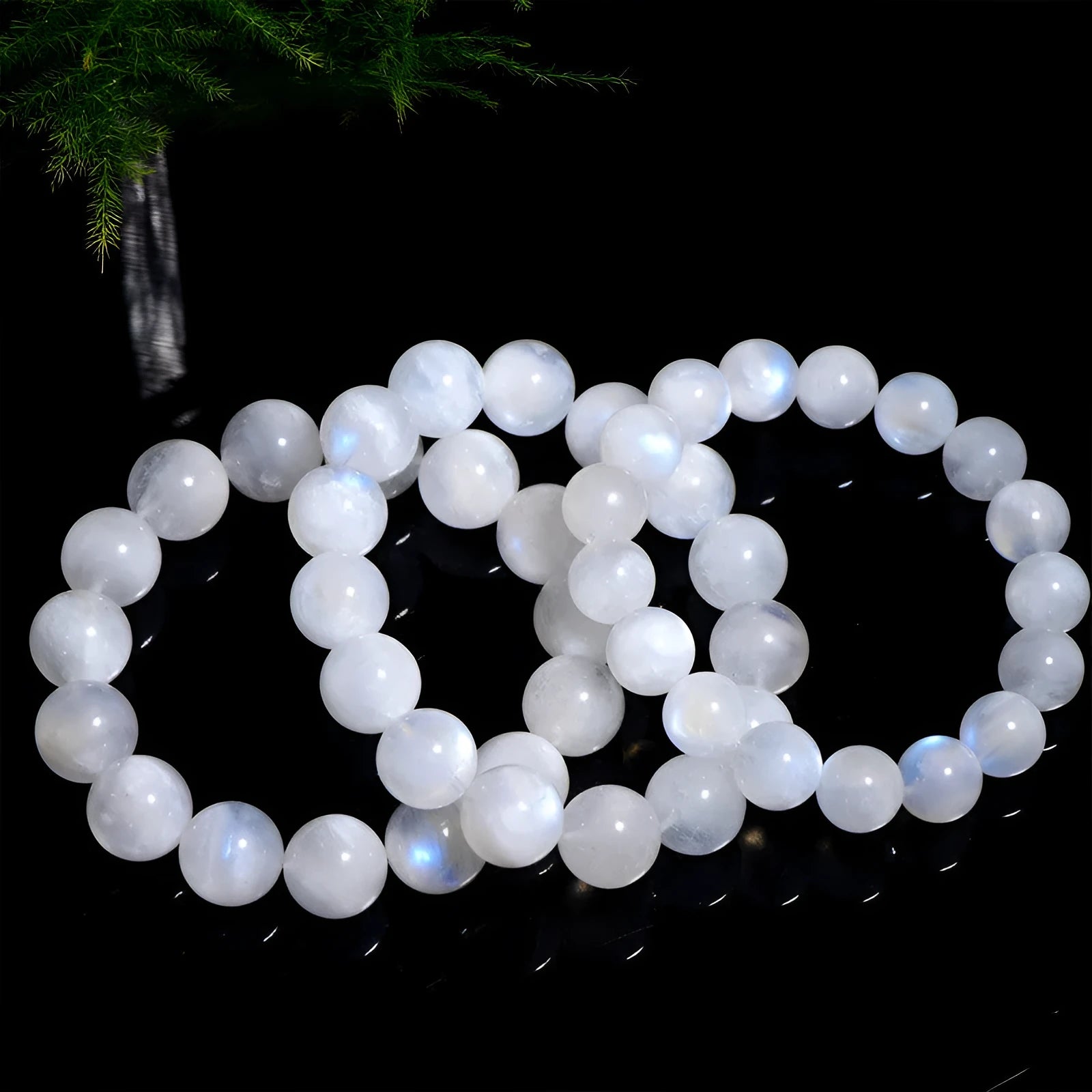 Natural blue moonstone bead bracelet with round geometry-shaped beads on wrist
