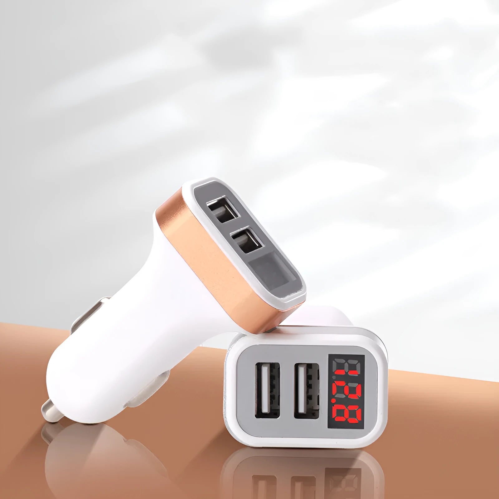 Gold mini digital display car charger with USB port shown next to a mobile phone