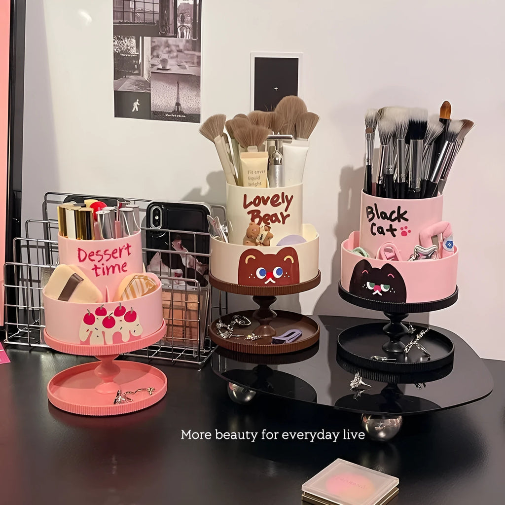 Rotating cosmetic brush storage barrel in a choice of colours on a table, showing its carousel design.