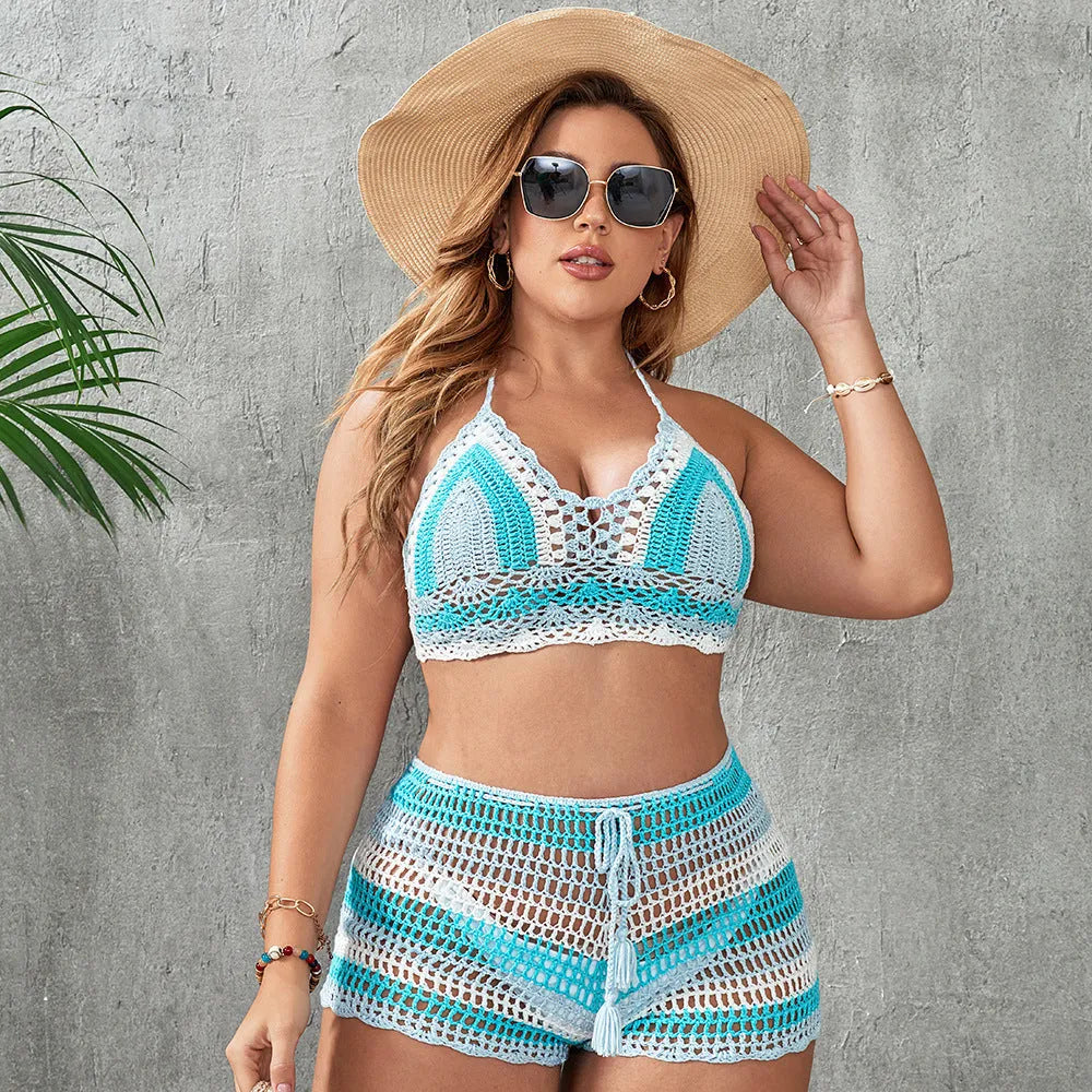 Blue women's plus size hollow out strap split swimsuit briefs on a white background.