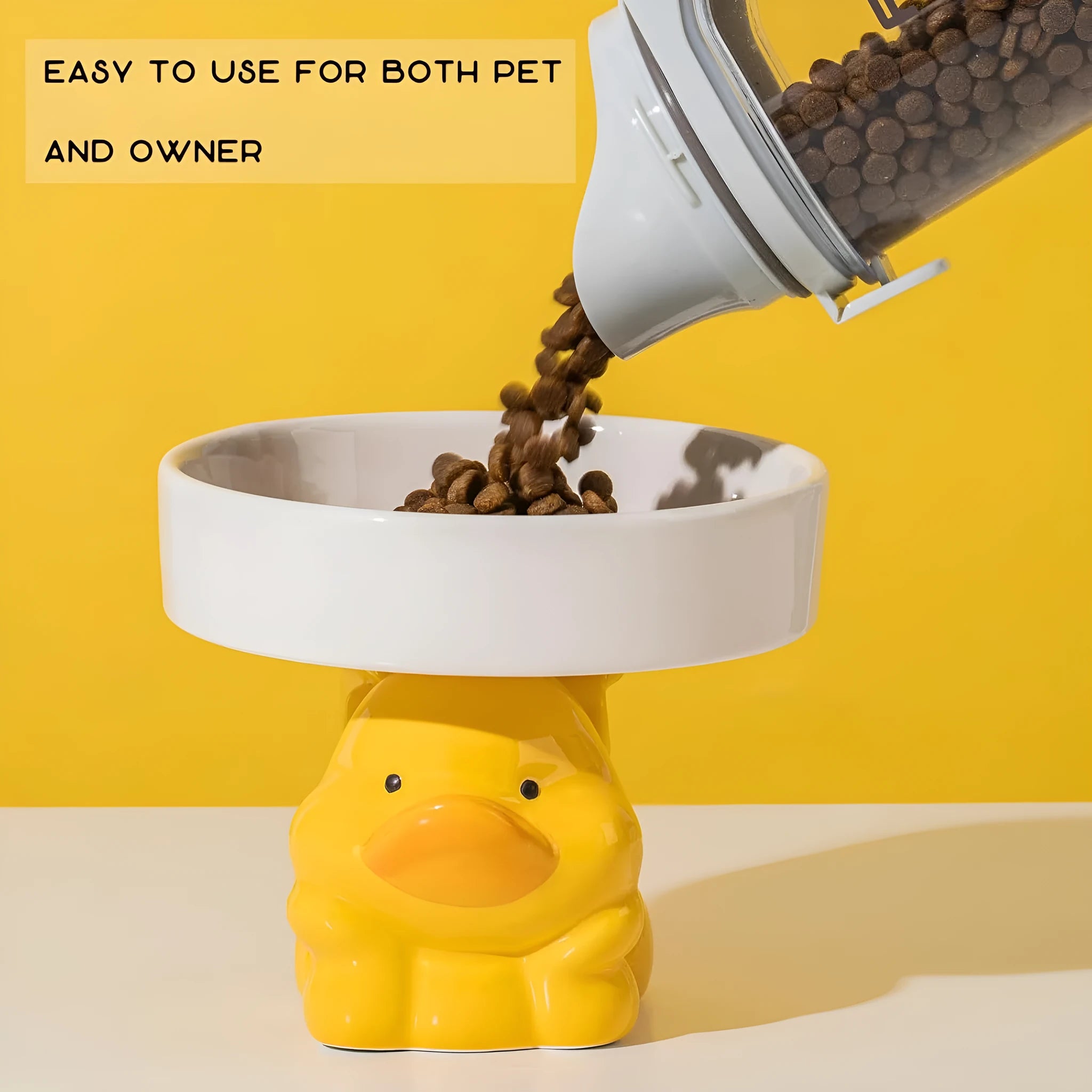 Raised ceramic pet bowl in animal design, showing wide opening for whisker comfort