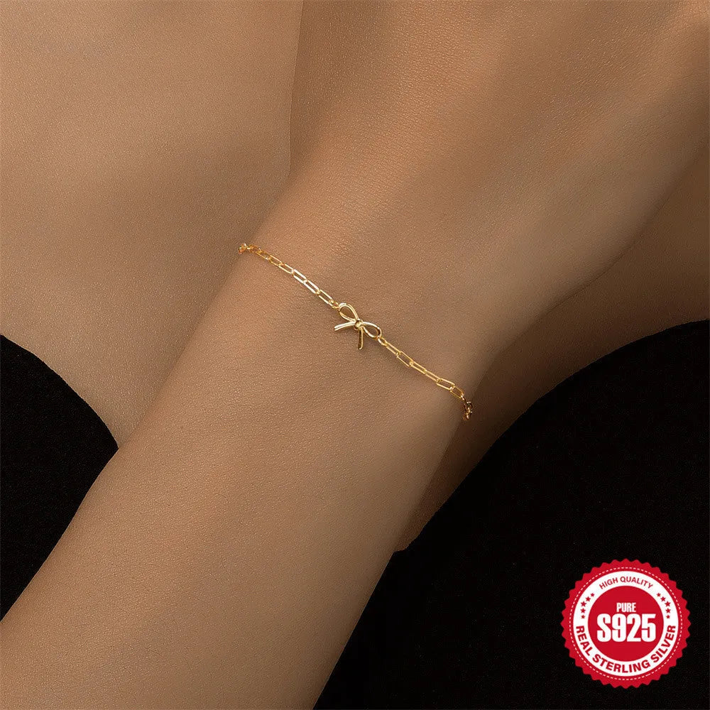 S925 sterling silver bracelet with clip chain clasp and geometric heart charm