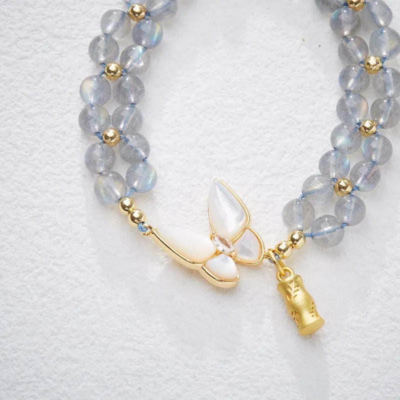 Grey moonstone butterfly charm woven bracelet for women with geometric retro design