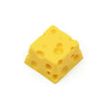 Yellow solid resin custom mechanical keyboard keycap with detailed cheese design