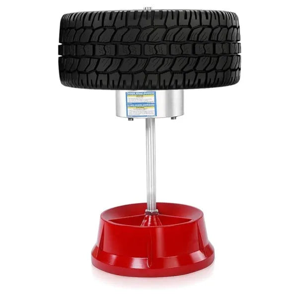 Portable hub balancer with aluminium head for car wheels showing bull's eye level and enamel-finished base