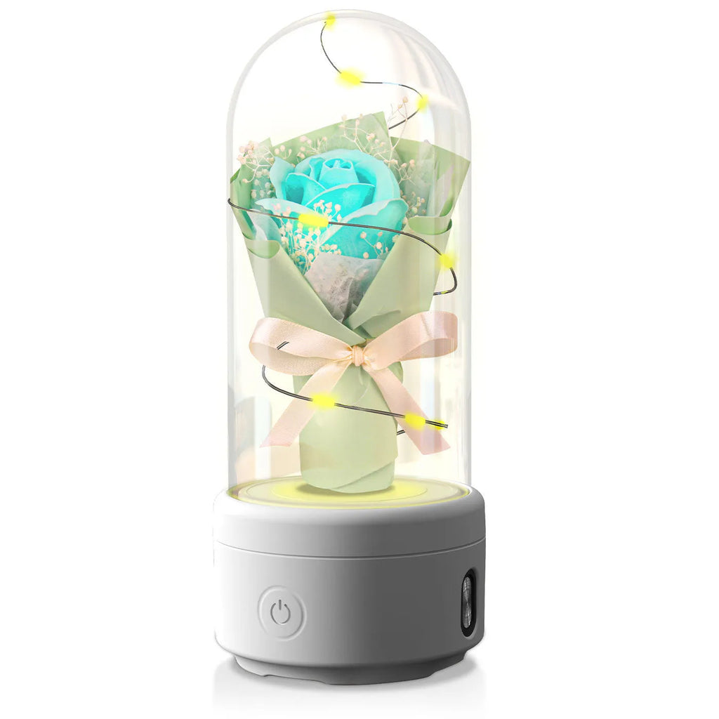 Glass-covered rose ornament with built-in LED light and Bluetooth speaker on black or white base