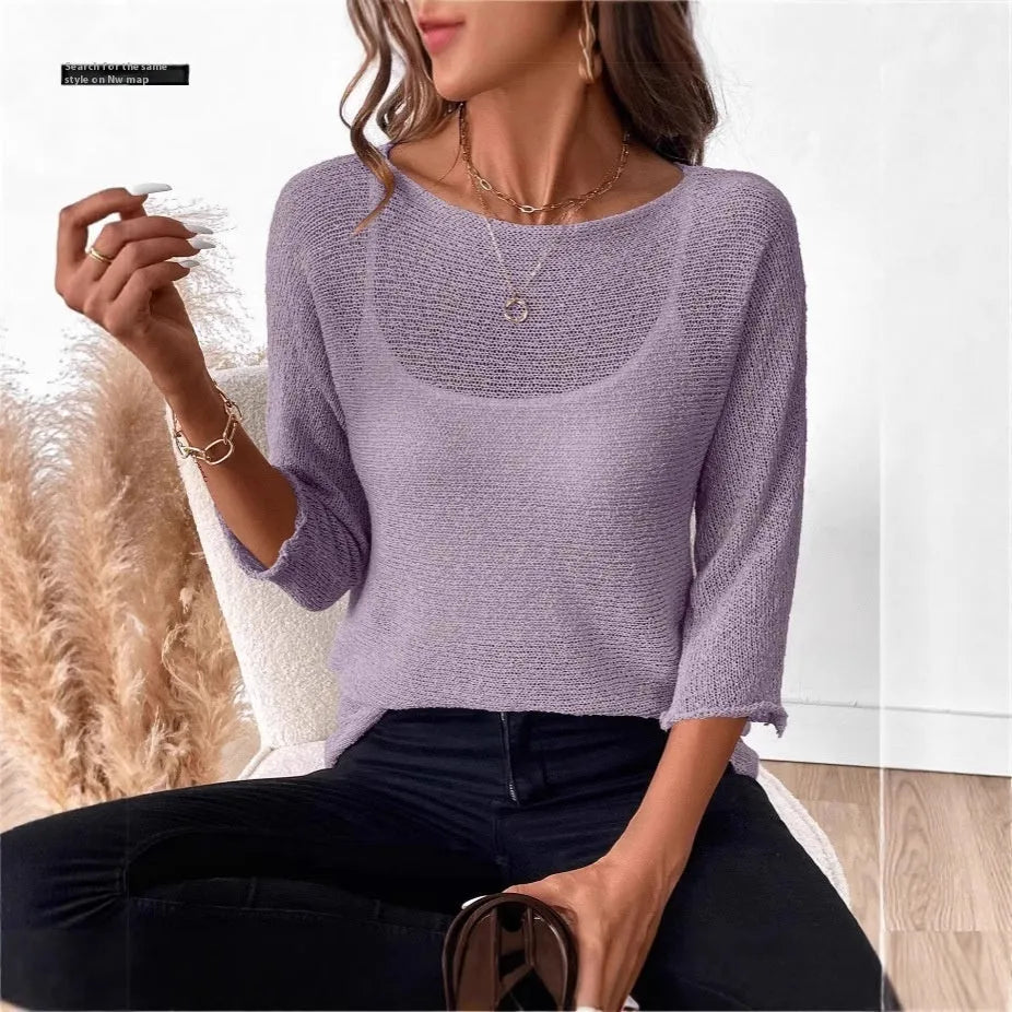 Women's off-shoulder knitted jumper in light blue with a 3D pattern and 3/4 sleeves.