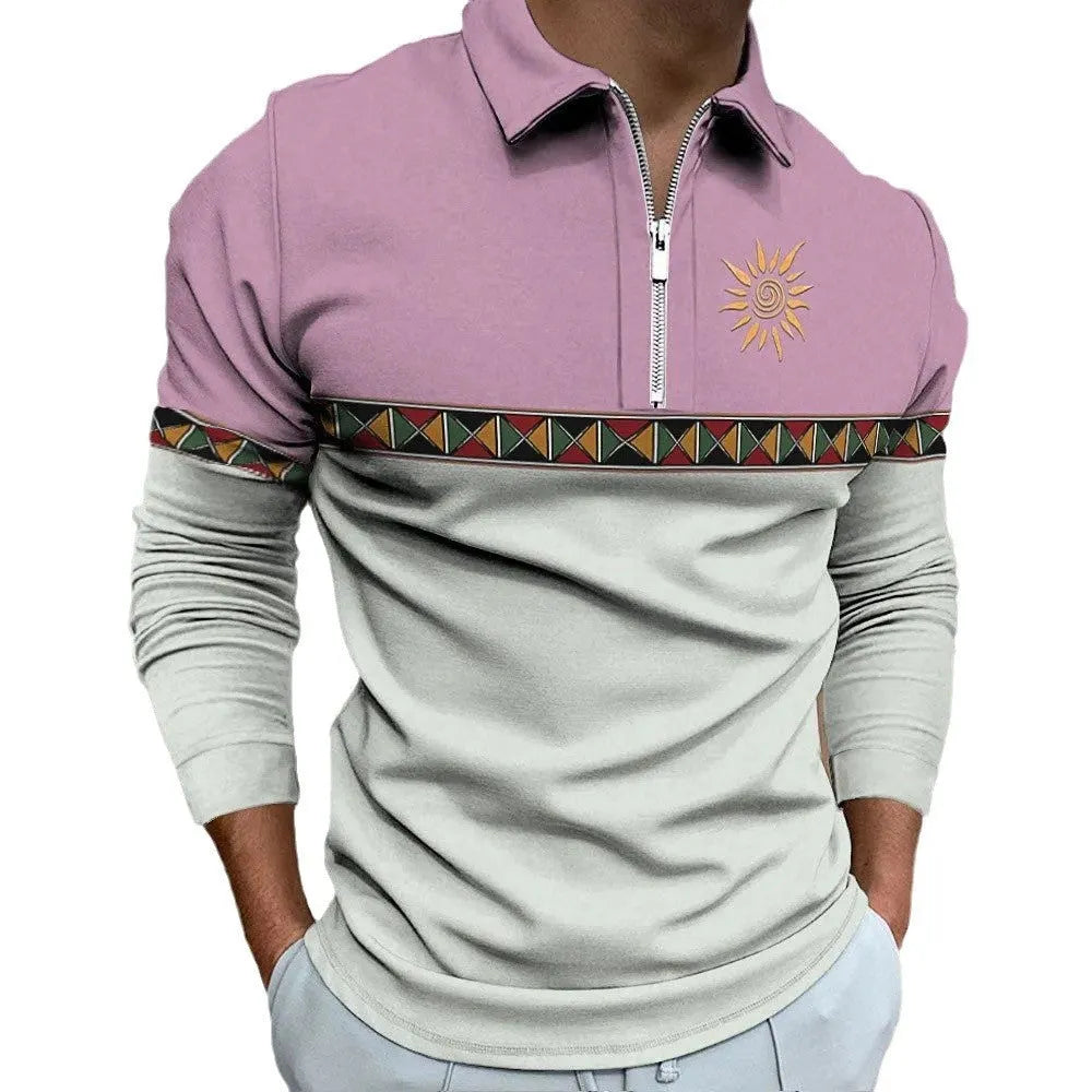 Man wearing a loose-fit, long-sleeve t-shirt with retro striped colour printing and a decorative zip detail.