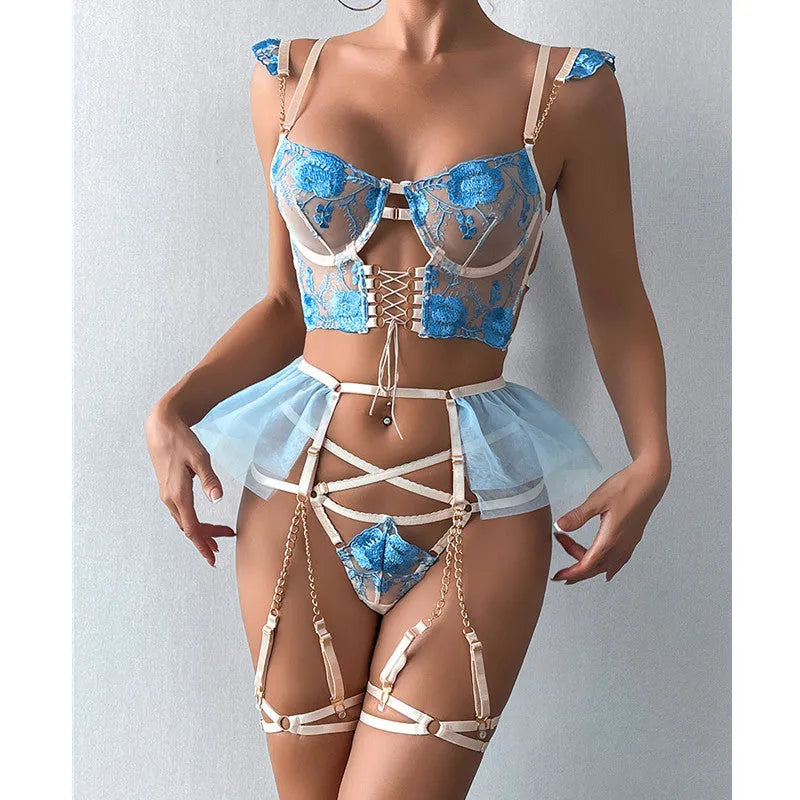 Light blue embroidered lace bra and matching briefs set on a plain background