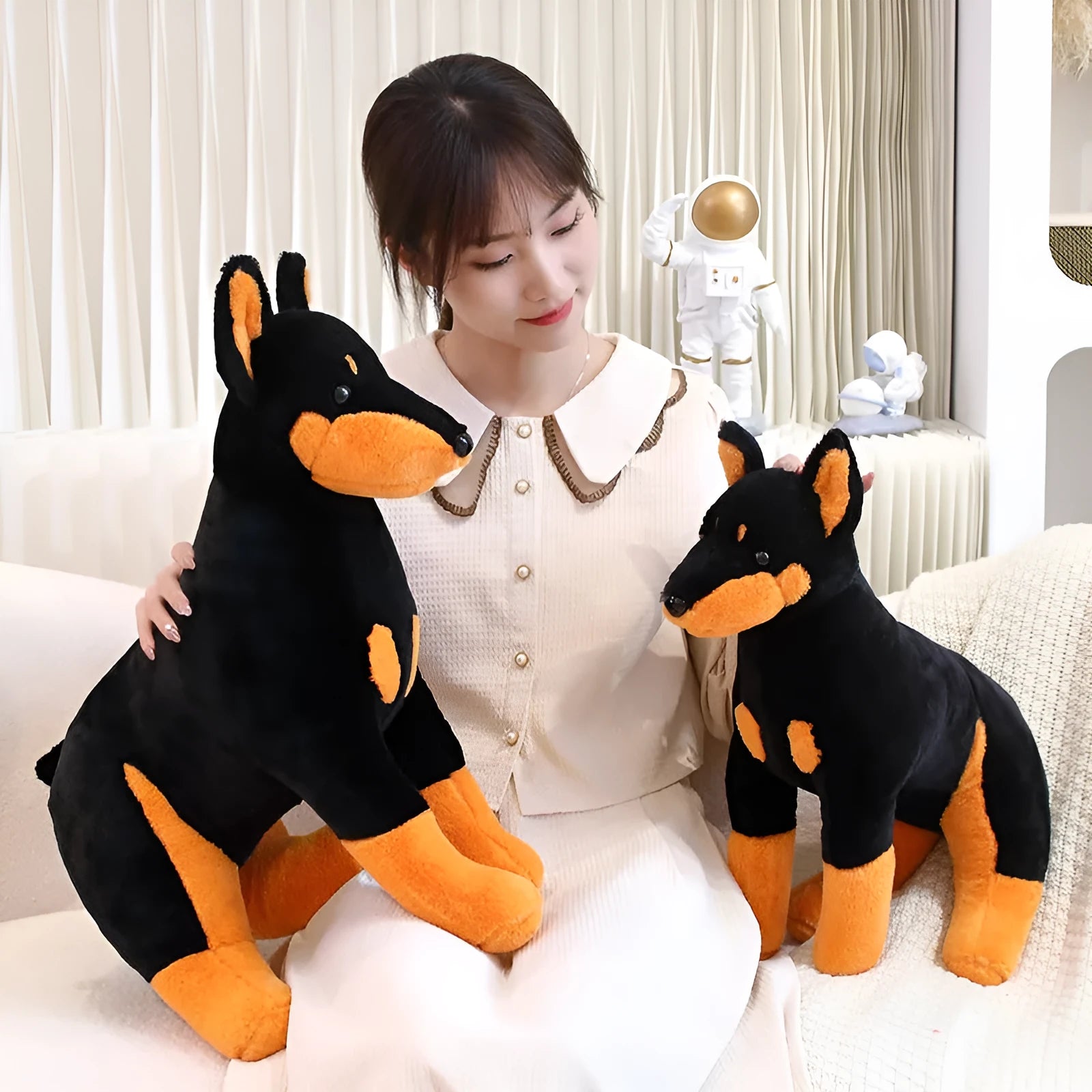 Black Doberman Pinscher plush toy with short plush surface, available in 40cm or 55cm sizes