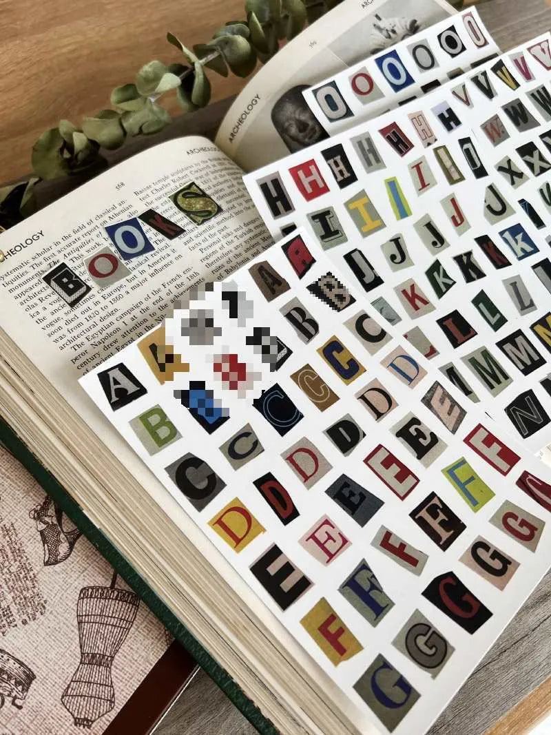 English letters and numbers symbol label stickers showing A-E letters and week words in cute printed designs