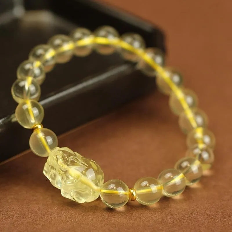 Yellow citrine Pi Xiu bracelet with artificial crystal beads on leather band