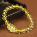 Yellow citrine Pi Xiu bracelet with artificial crystal beads on leather band