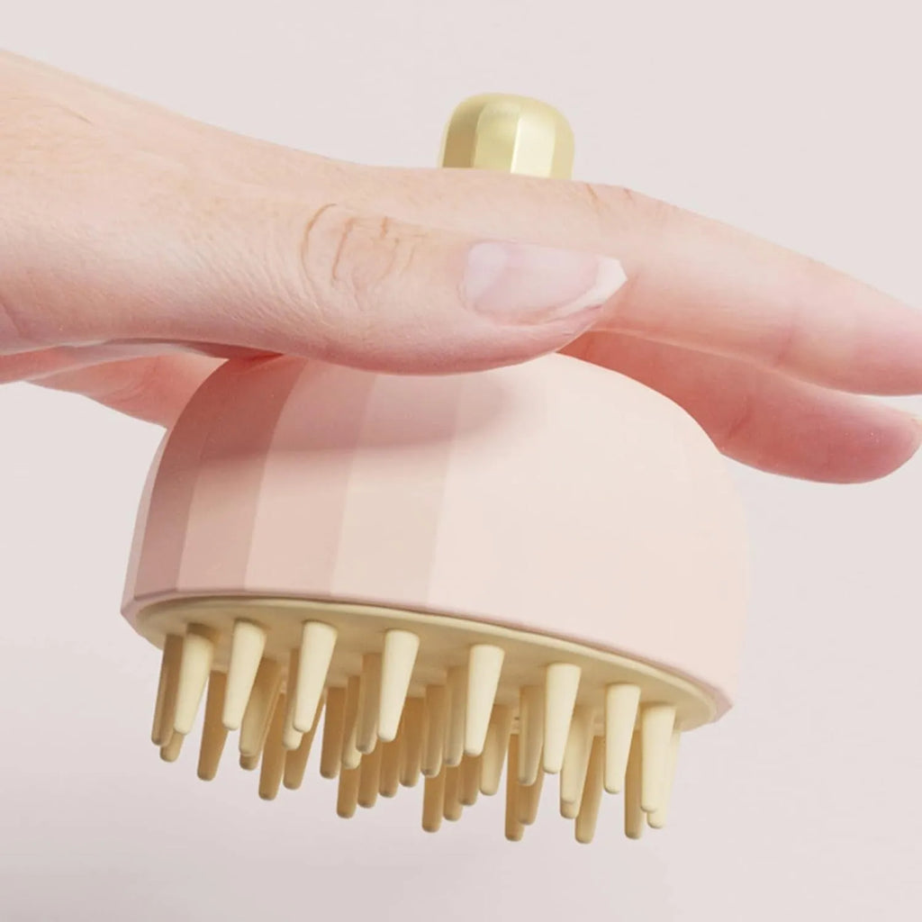 Double-sided dog bath massage brush with drain holes for pet grooming and shampoo application