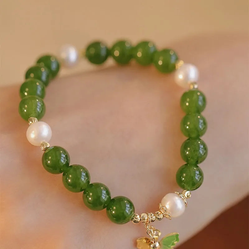 Green chalcedony bracelet with geometric shaping and round decorative elements