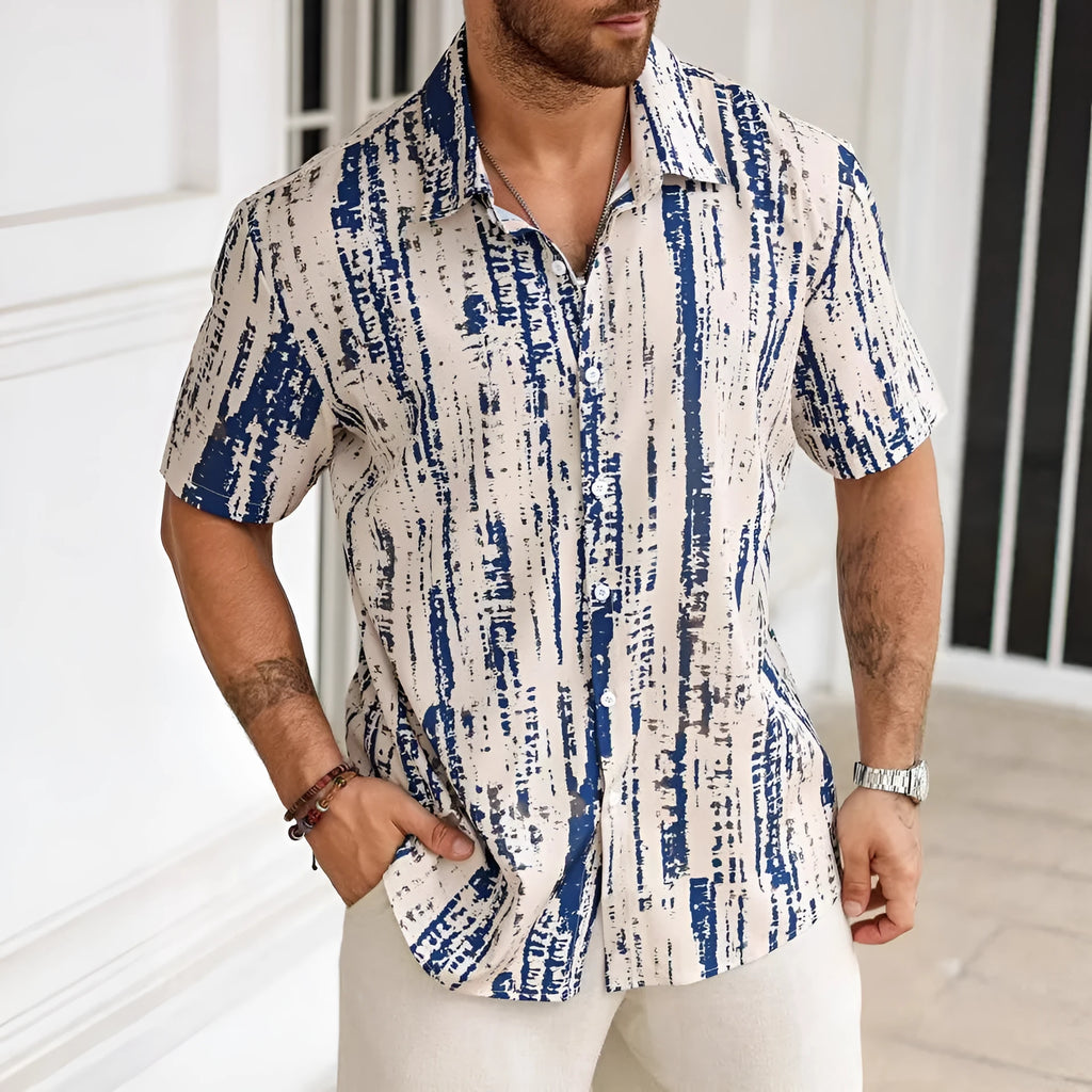 Man wearing a striped 3D printed short sleeve casual shirt in light blue.