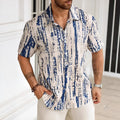 Man wearing a striped 3D printed short sleeve casual shirt in light blue.