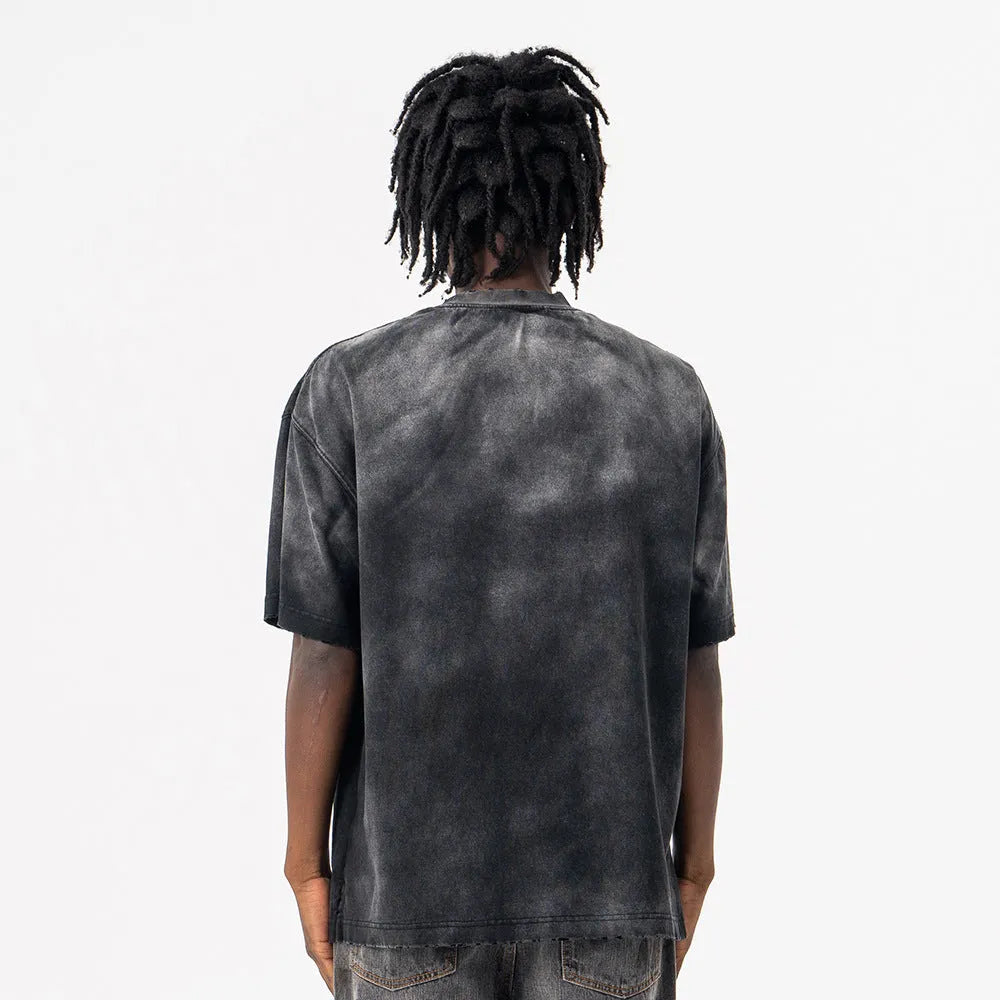 Black men's loose fit cotton T-shirt with printed white letter design and drop-shoulder sleeves