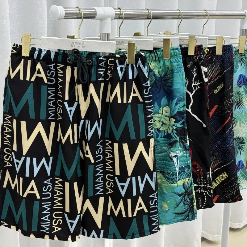 Men's ice silk beach pants with striped pattern showing loose fit and elastic waist