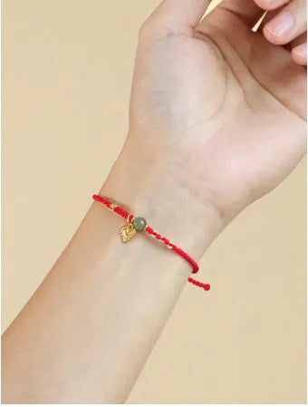 Handmade woven women's bracelet crafted from 925 silver with Hetian jade in red colour option