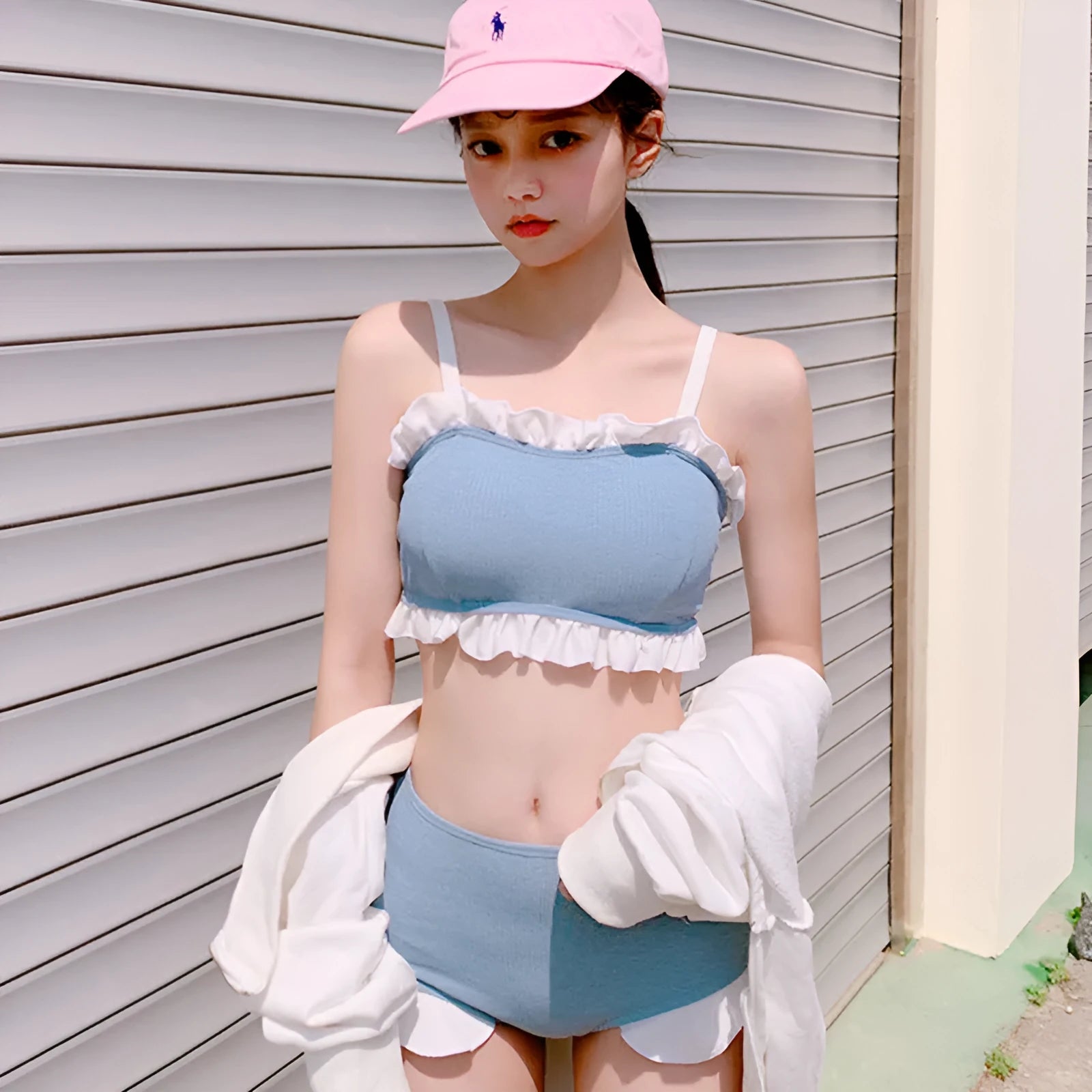 Women's solid colour swimsuit with fashion suspenders and conservative split design