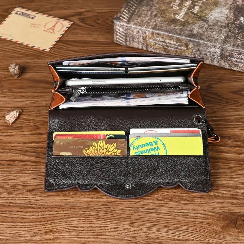 Retro brown embossed floral tri-fold wallet made from genuine cowhide leather.