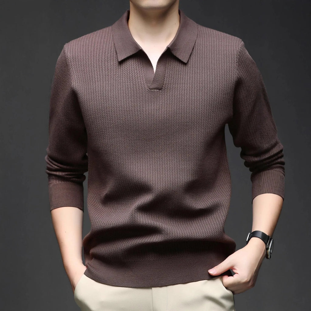 Man modelling a loose-fit green casual pullover sweater for autumn.