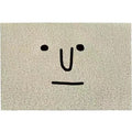 Square cartoon facial expression PVC floor mat in Mr. Big Nose colour and geometric pattern.