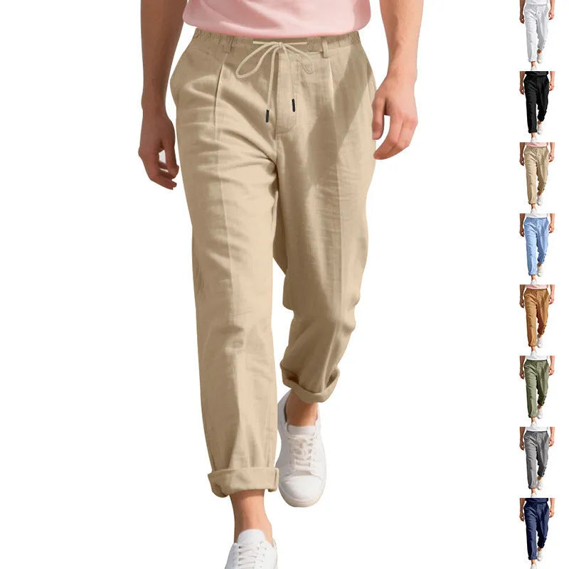 Men's linen casual trousers in a straight-leg style with drawstring waist, shown in a summer colour option.
