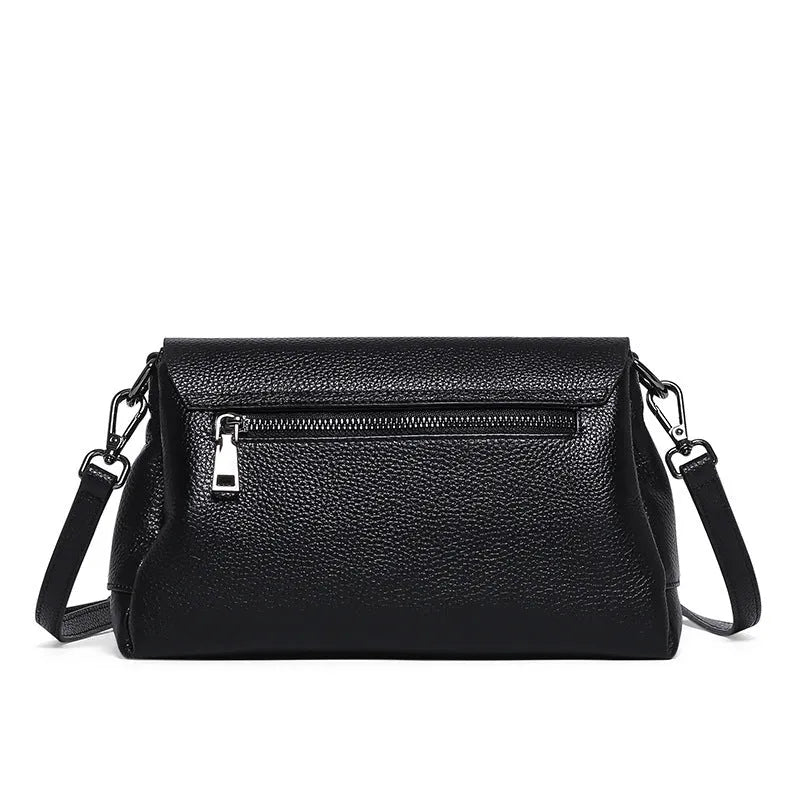 Women's soft first layer cowhide shoulder bag in black with adjustable strap and multiple pockets