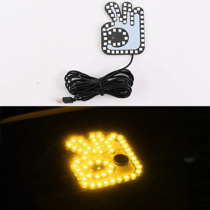 Car USB plug finger gesture light showing thumbs up, OK sign, and scissor hand controls with yellow and RGB LED colours