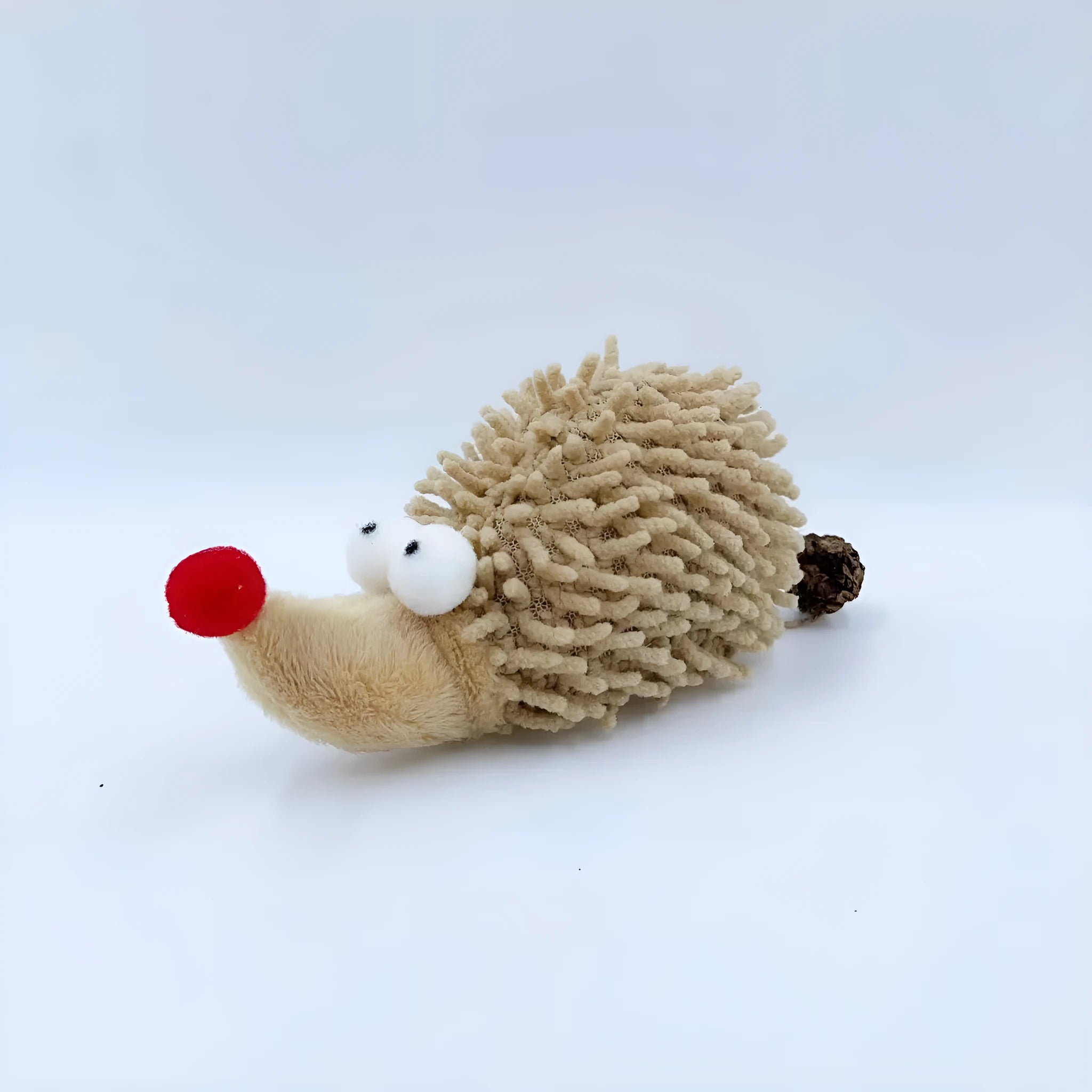Cute plush cartoon hedgehog cat toy in khaki, made from chenille with catnip for nibbling play