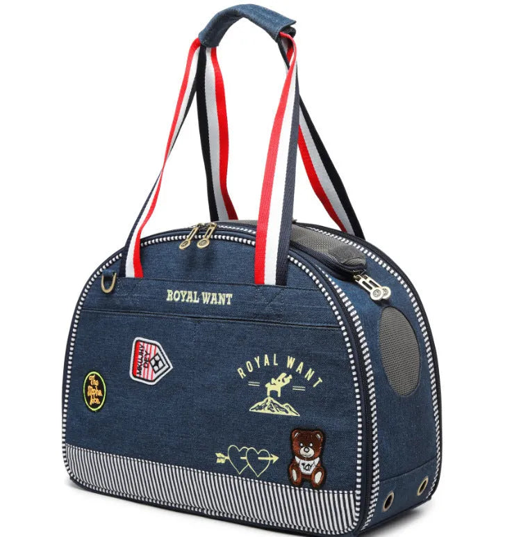 Blue denim pet diaper bag with cartoon print, dimensions 43x20x30cm.