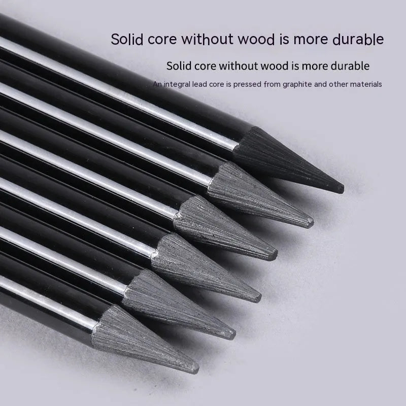 Set of six graphite and three carbonised drawing pencils on suction card packaging